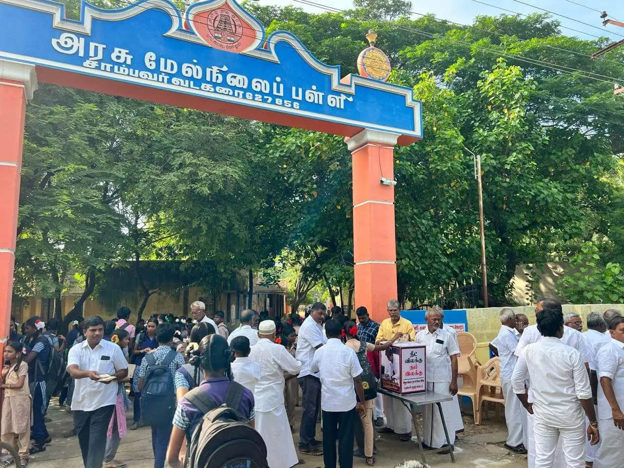 College students participating in BAN NEET signature collection drive