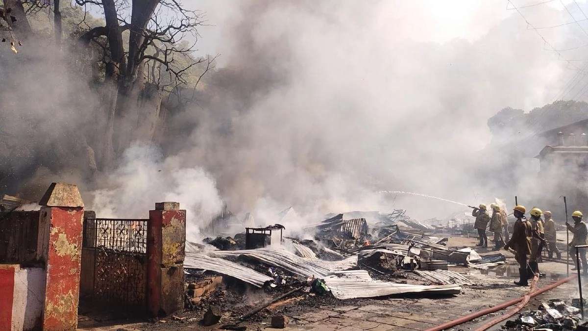 Emergency response and volunteer assistance during a fire accident near Kutralanathar Temple in Courtallam