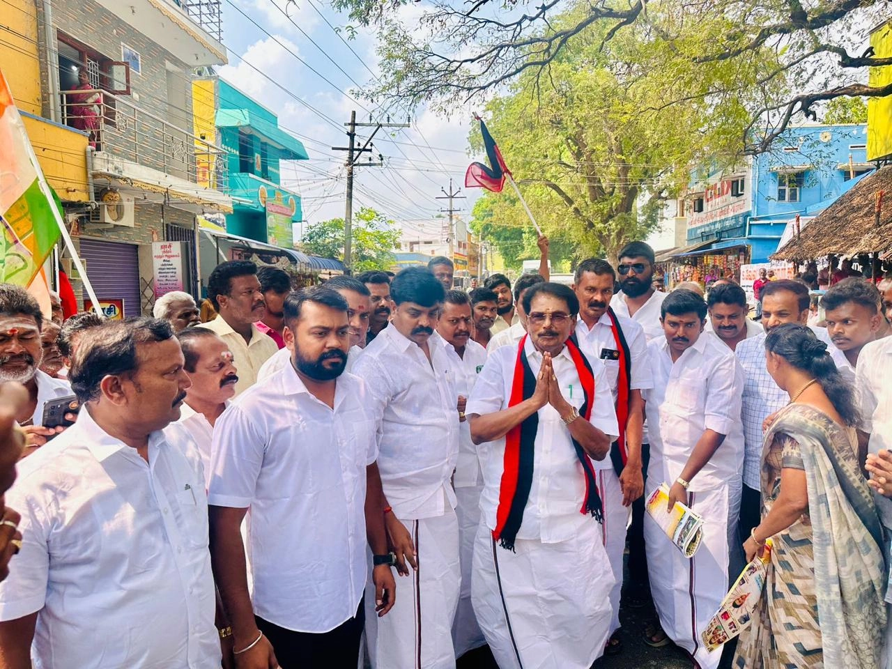 T.R. Krishnaraja and DMK Youth Wing volunteers conducting door-to-door outreach for 2024 election campaign
